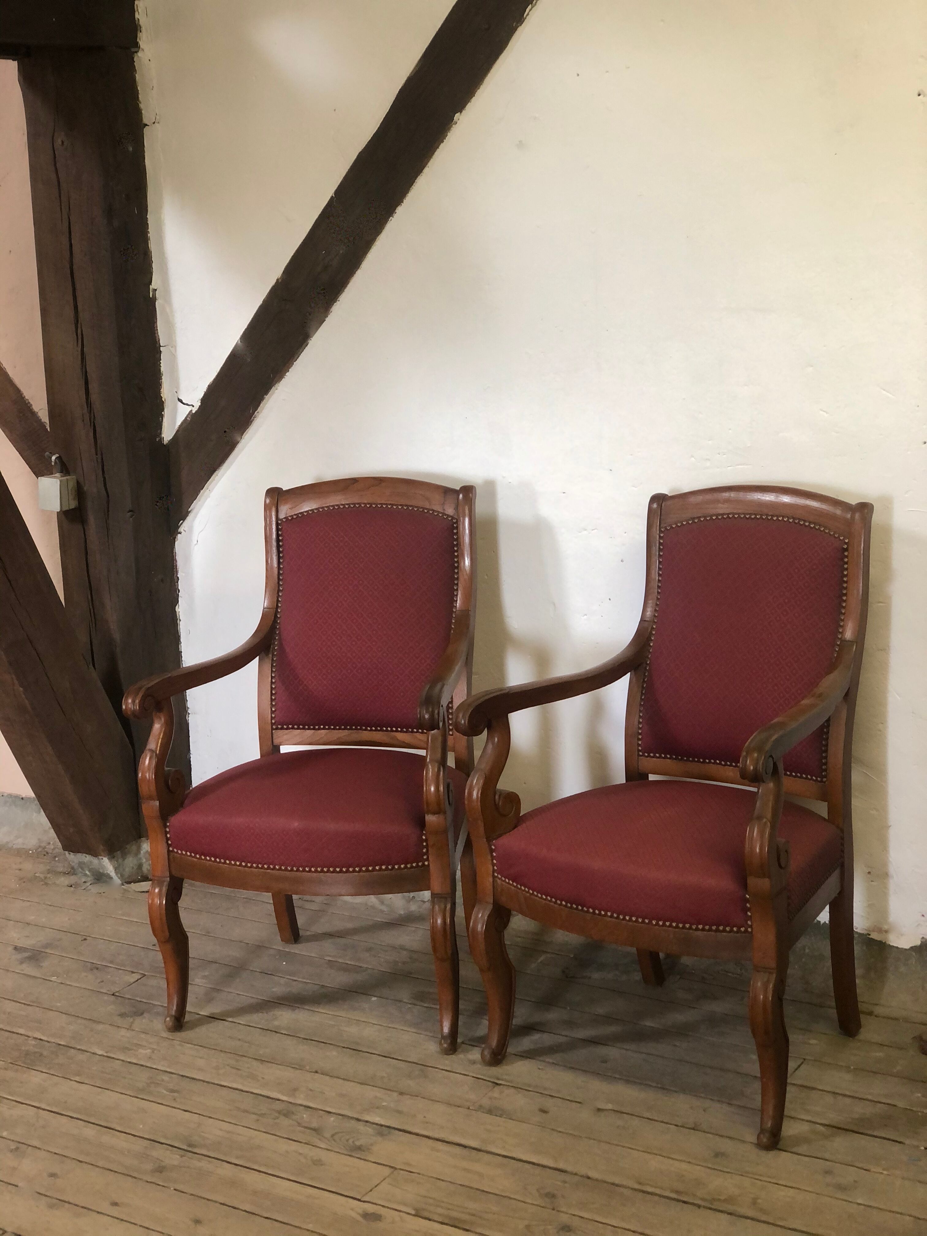 Louis Philippe era armchairs in burgundy-lined ground oak