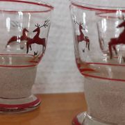 Glasses and carafe decorated with red Christmas reindeer and white granita 60's