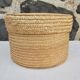 Straw covered basket