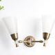 Pair of wall sconces in gold metal and plexiglass, 50 years