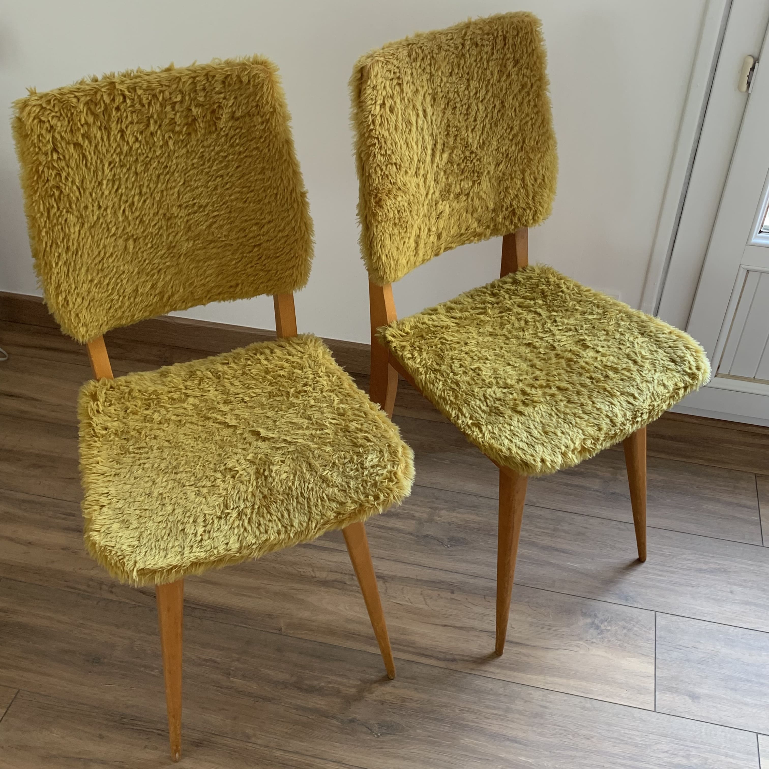 2 yellow moumoute chairs
