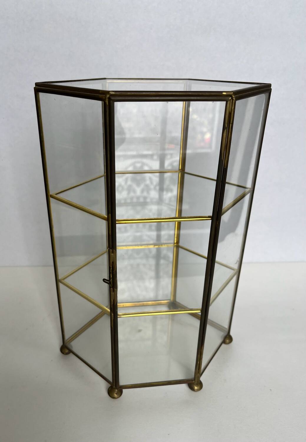 Small glass shelf on feet