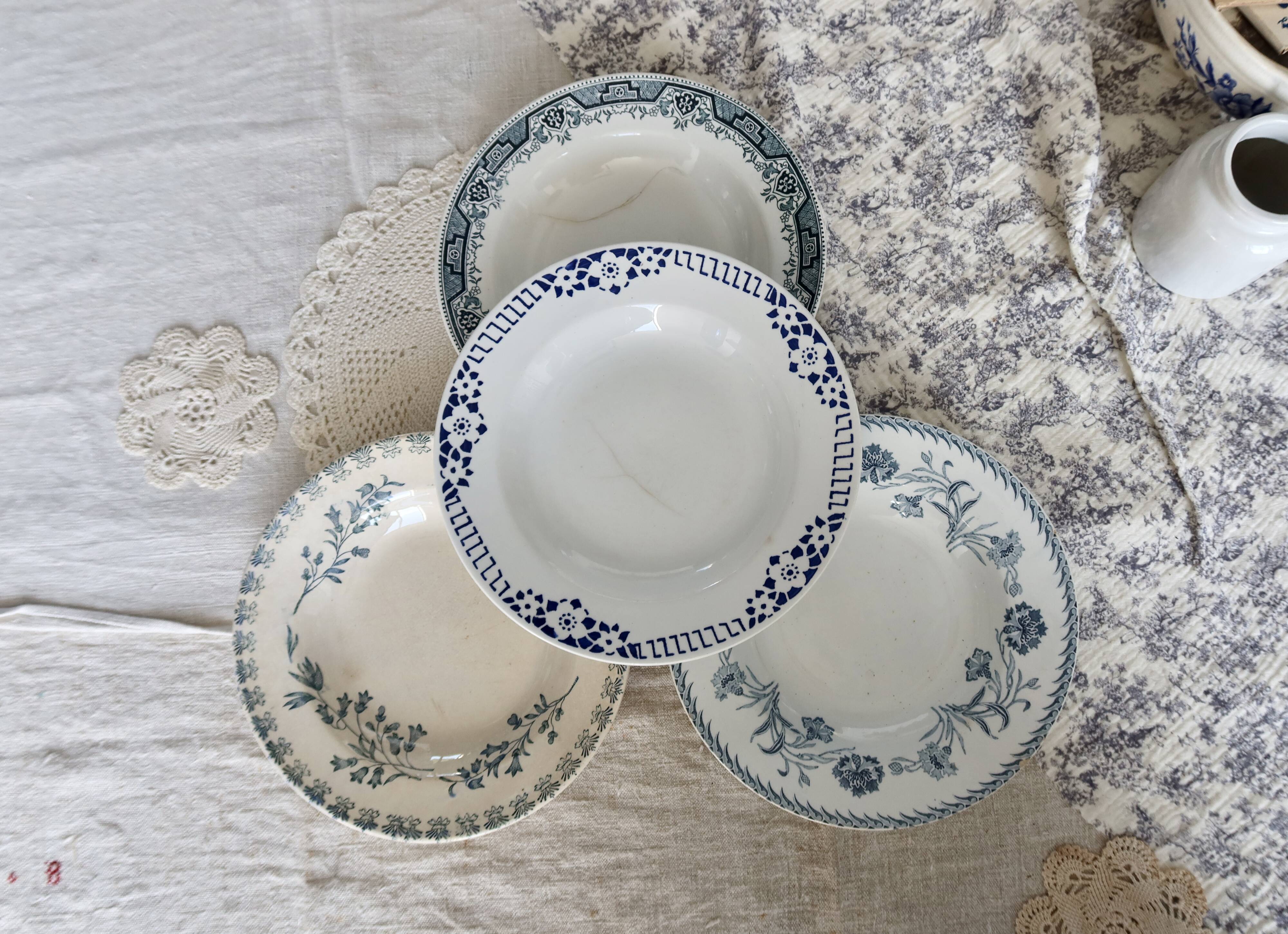 4 vintage blue ironstone soup plates