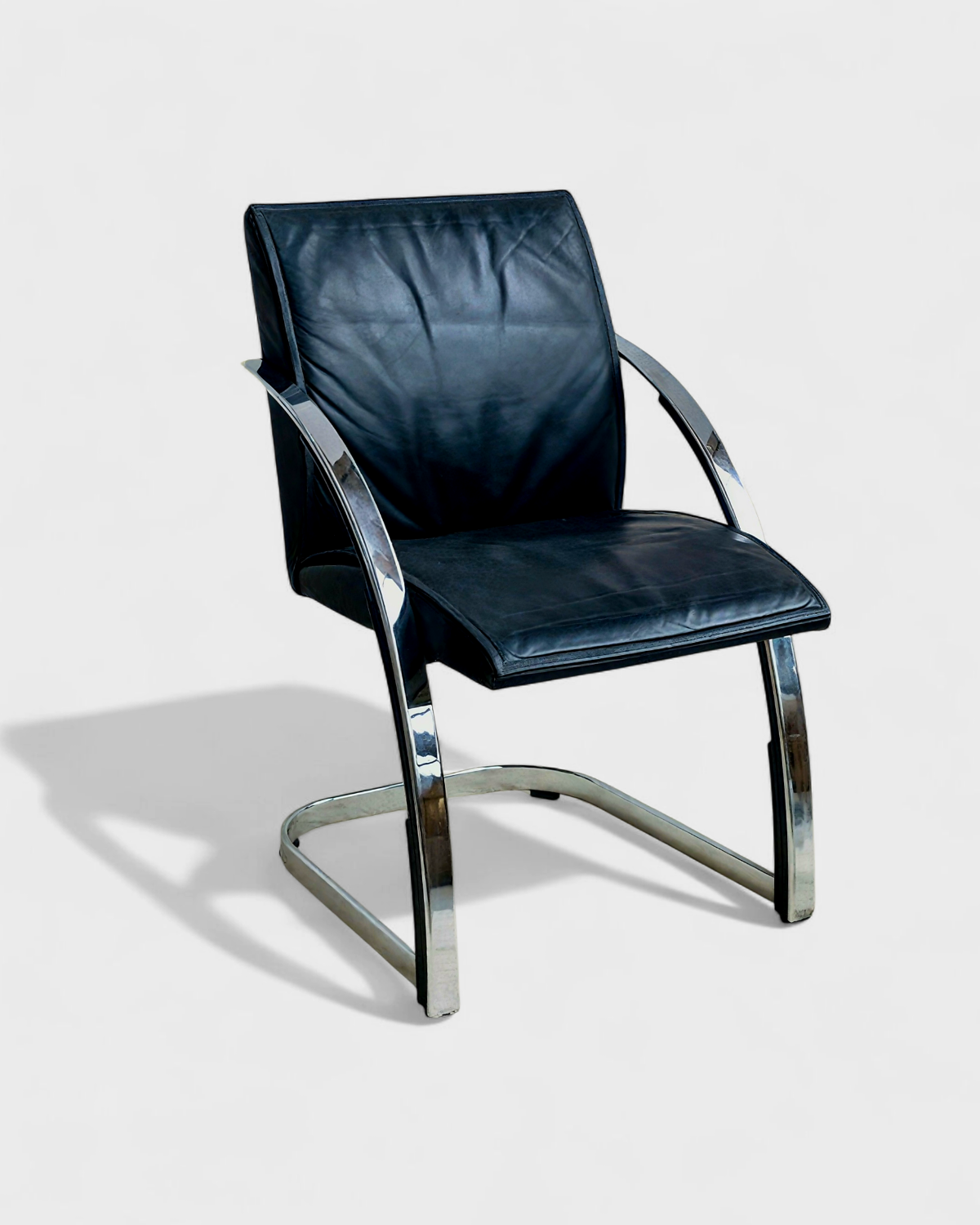 Set of 6 black leather armchairs — Gisberger — Circa 1980