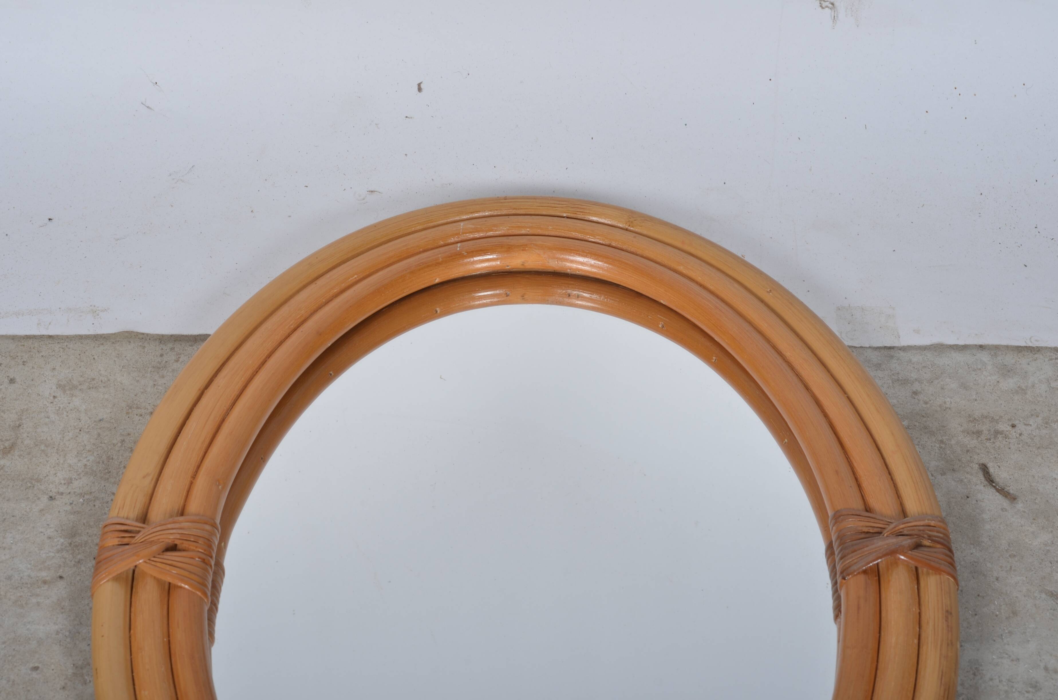 Oval rattan mirror