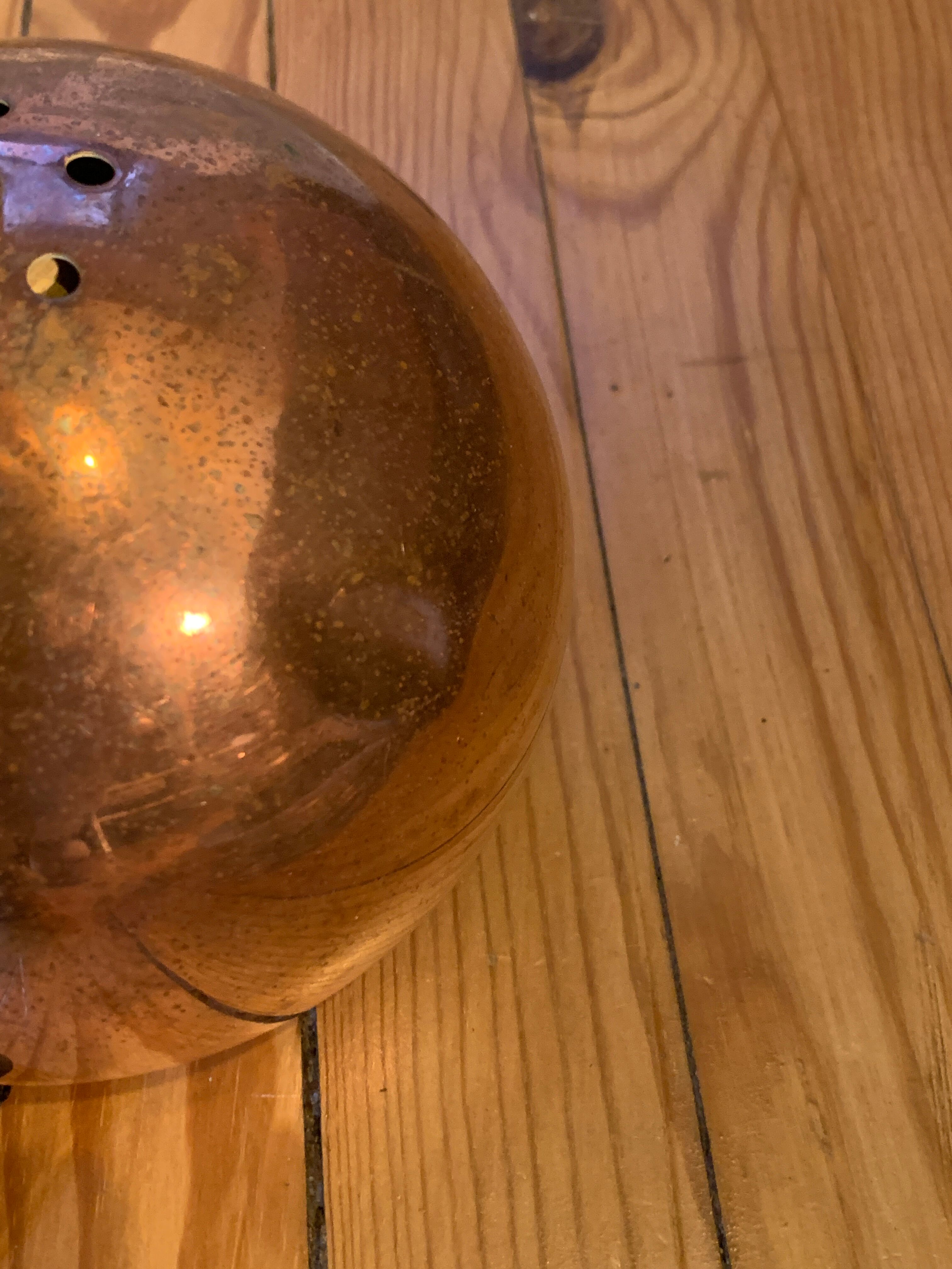 Copper-plated brass globe light fixture