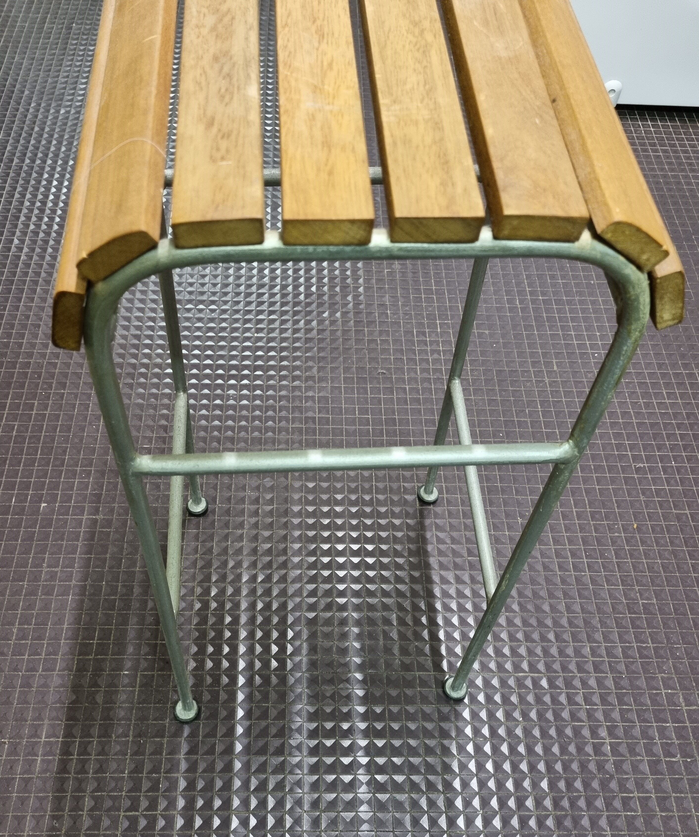 Vintage bar stool made of wood and metal