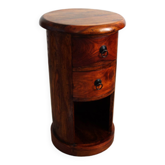 Small circular side piece of furniture or chest of drawers in rosewood from the 60s, India
