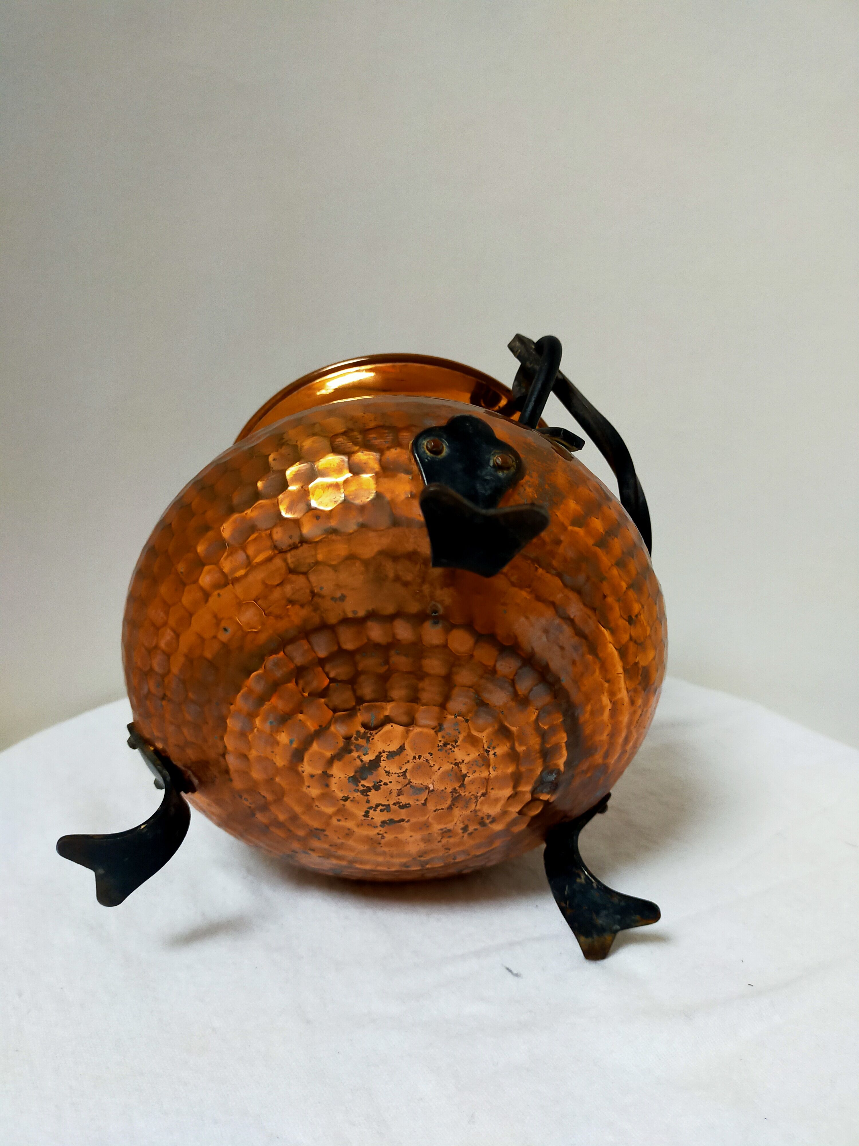 Copper cauldron on feet
