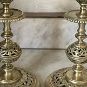pair of openwork gilded brass candlesticks from the 19th century