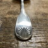 Small silver metal ladle from the Christofle brand, shell model