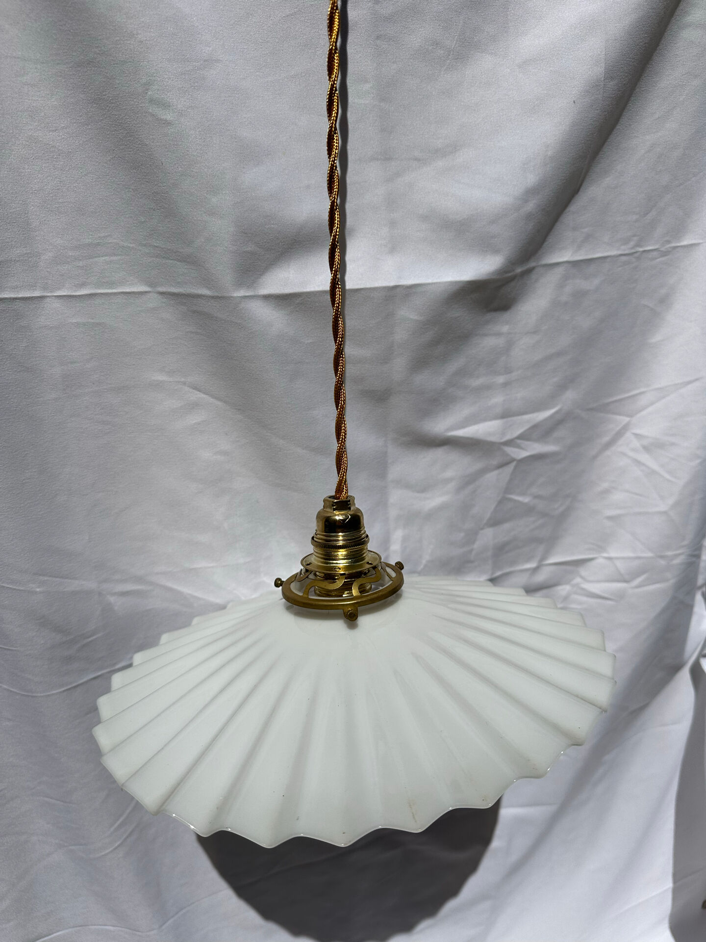Vintage suspension opaline pleated lampshade with golden threads and claw socket.