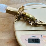 Louis XV bronze wall light with a flowing branch design and acanthus leaf decoration.