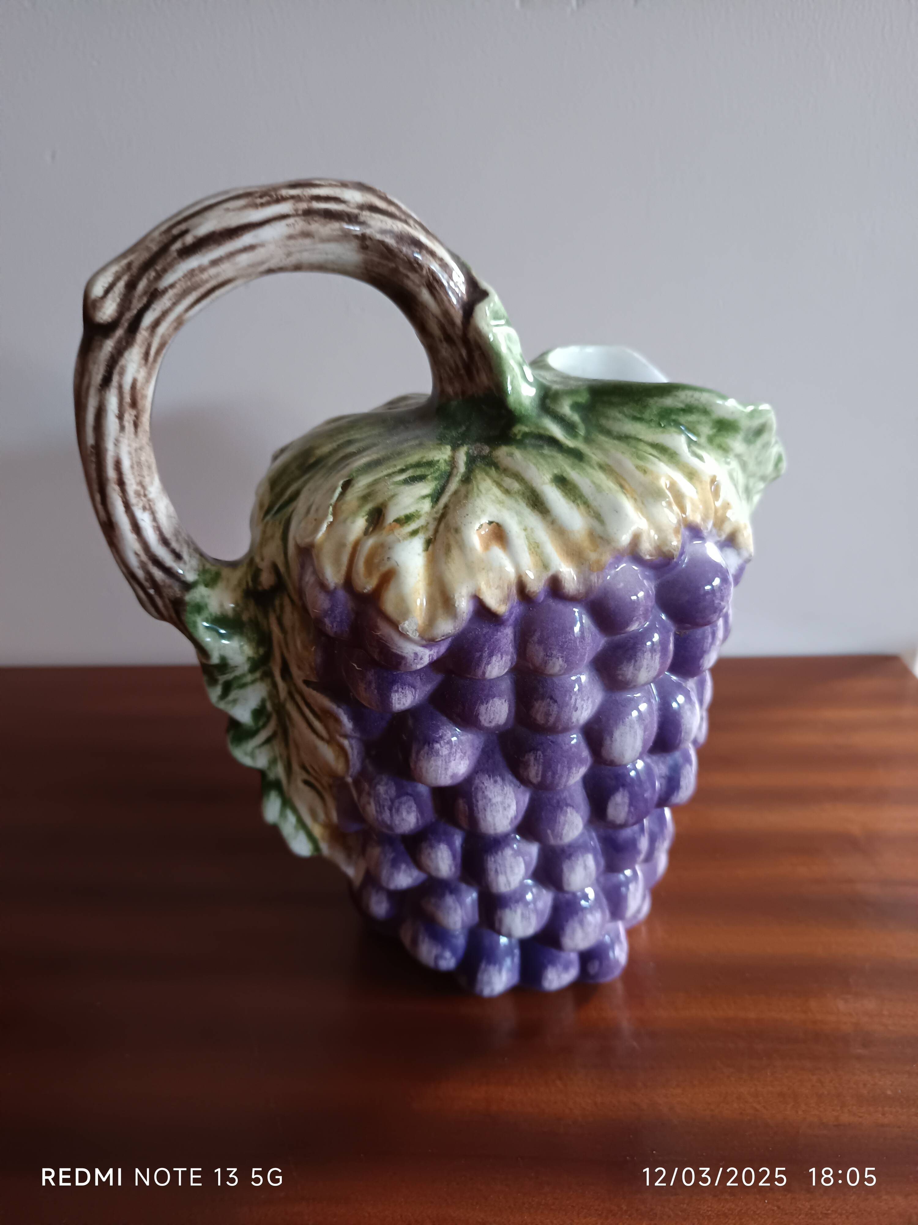 Antique grape-shaped slip pitcher