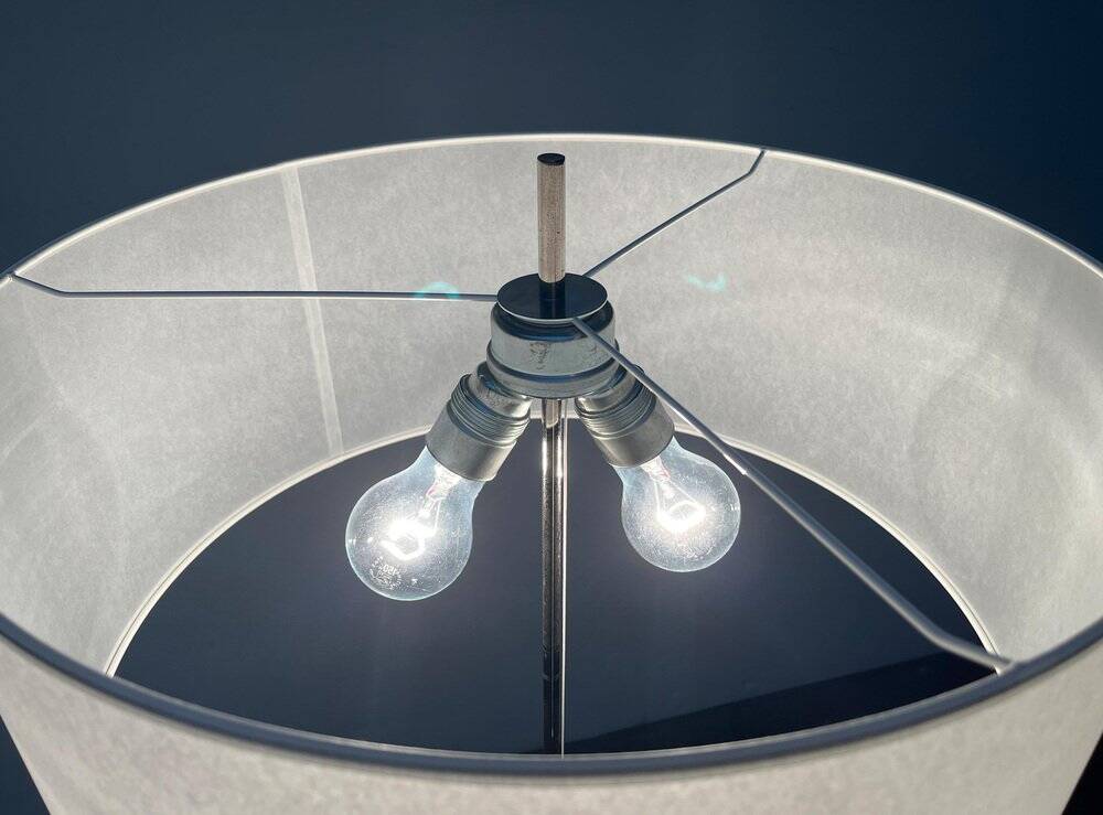 Mid-century German minimalist tripod floor lamp from the 1960s.