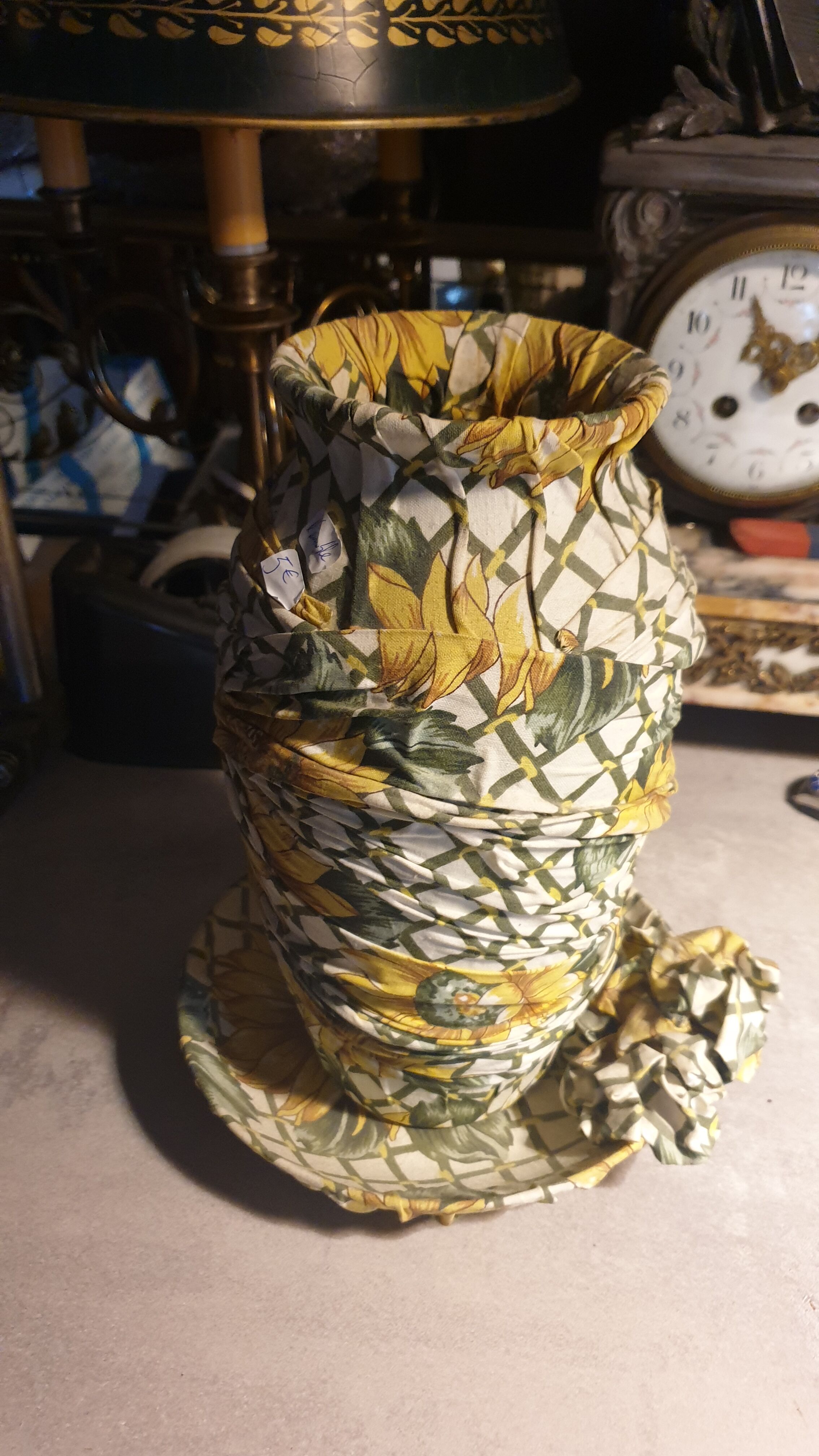Vase and ceramic cup in fabrics