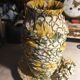 Vase and ceramic cup in fabrics