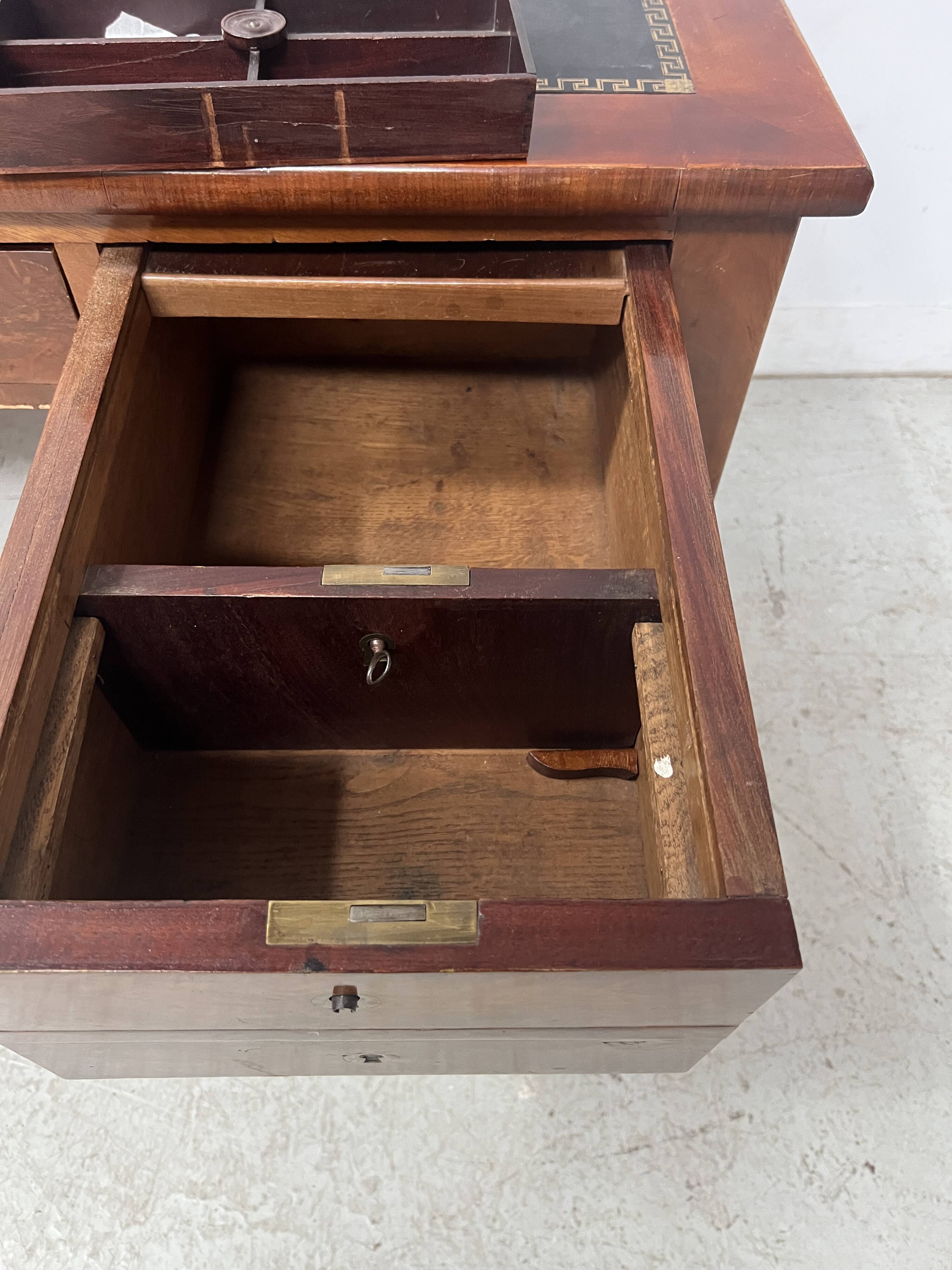 Louis XVI style flat desk in walnut and veneer, 19th century.
