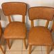 Set of 4 vintage chairs in solid beech and caramel faux leather.