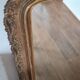 Antique Louis Philippe mirror with a pediment.