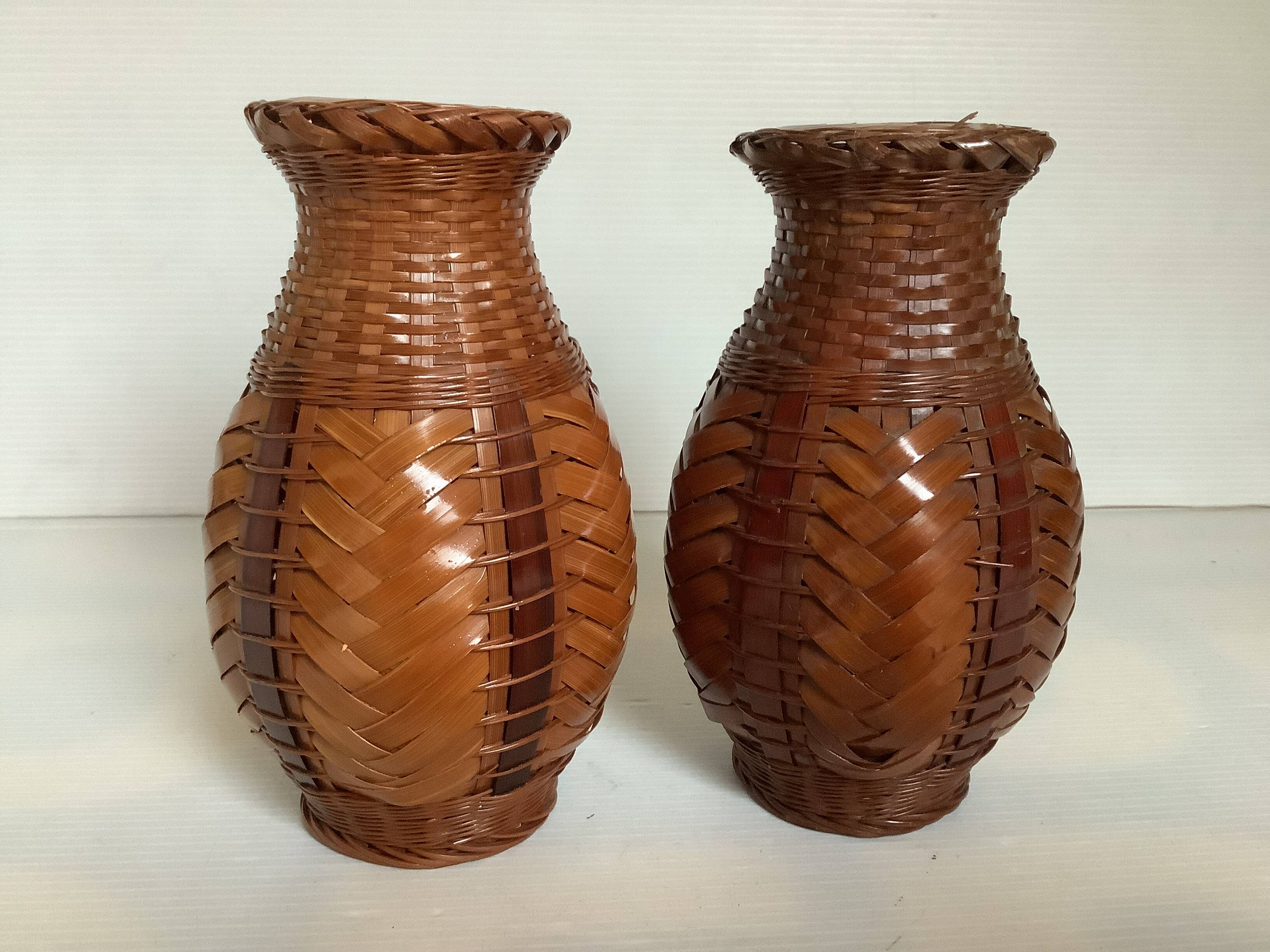 Pair of small woven vases in wicker rattan straw