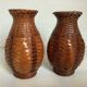 Pair of small woven vases in wicker rattan straw