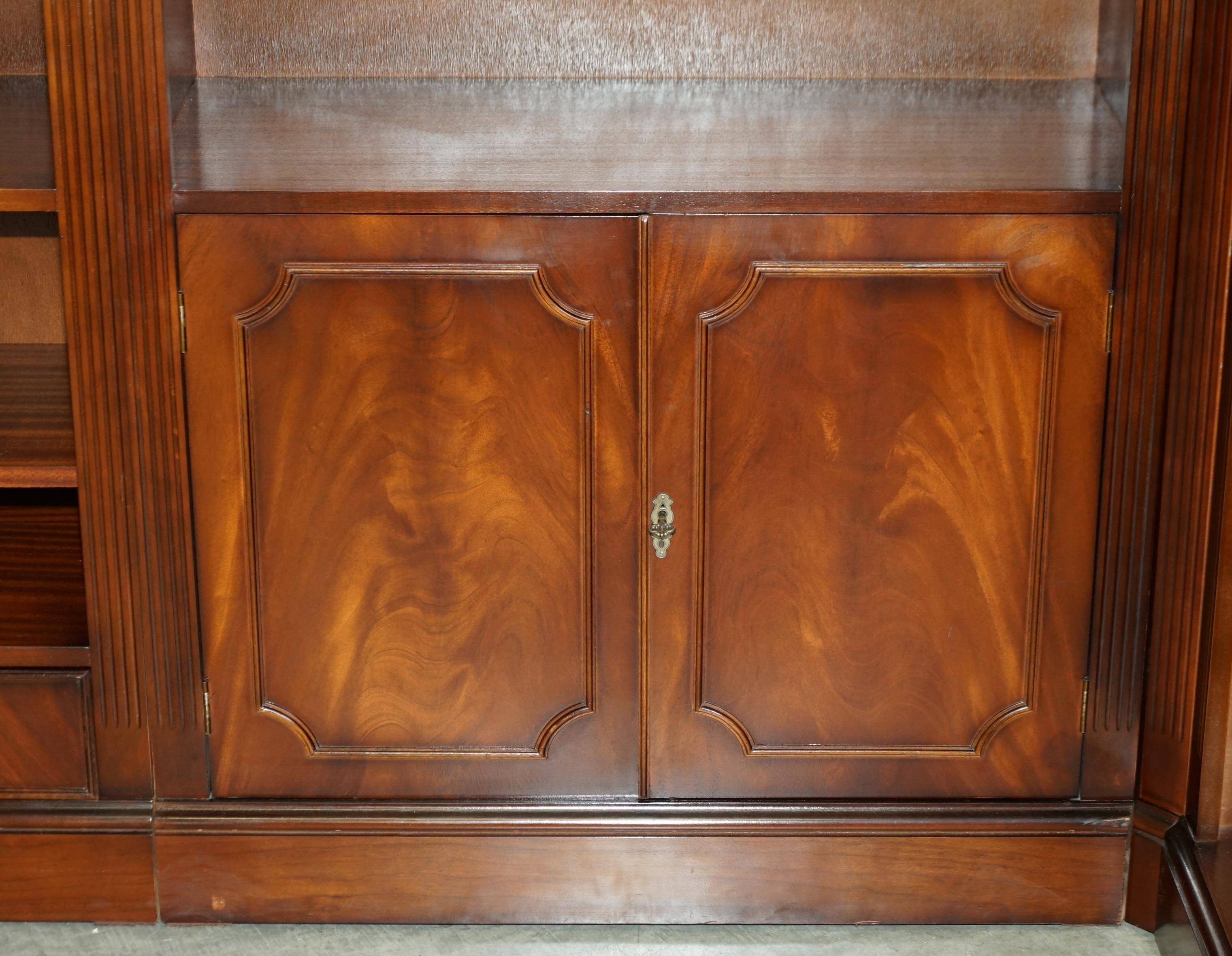 Corner library made of flamed hardwood, in 3 parts.