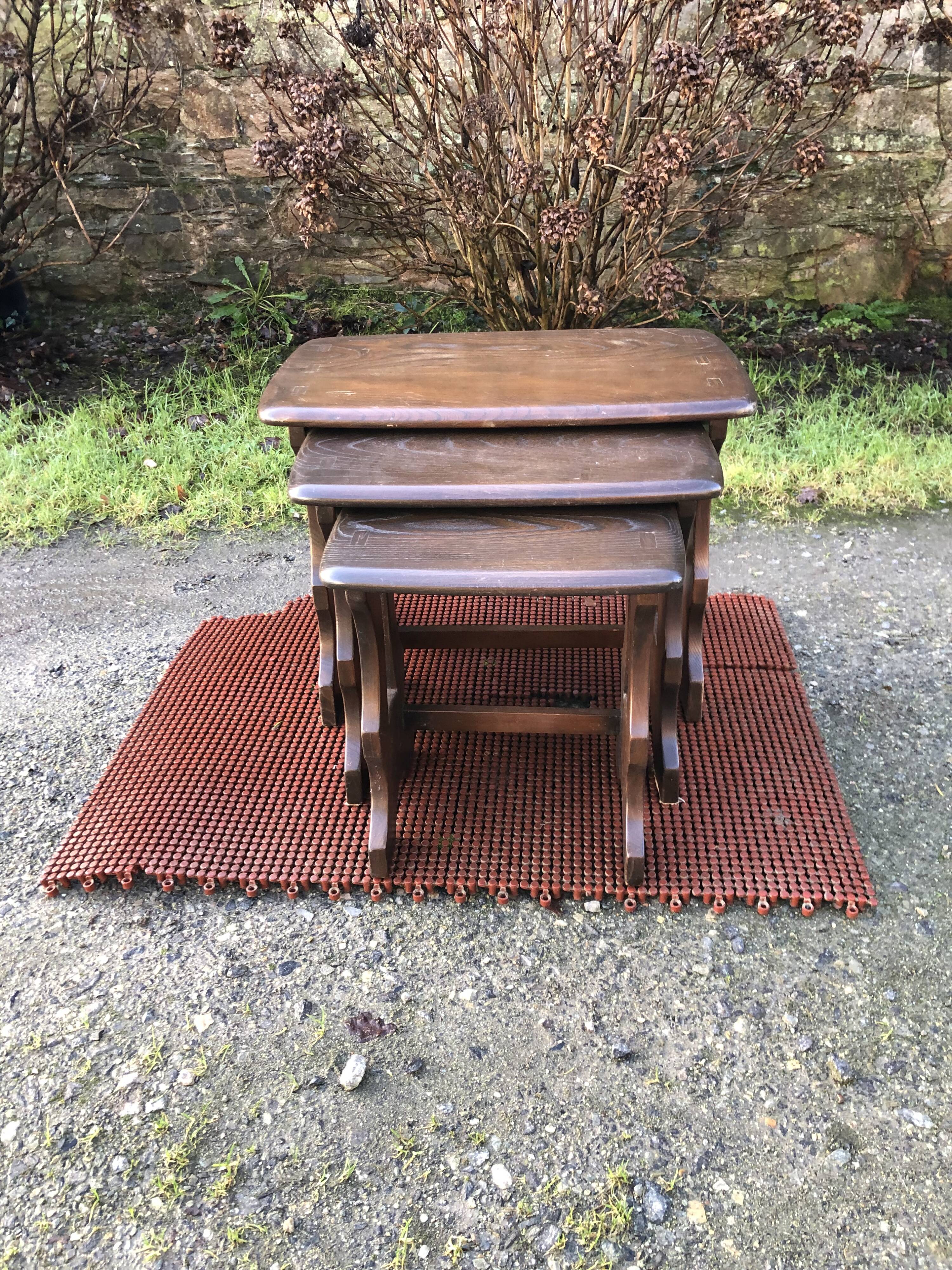 Vintage English nesting tables in elm.