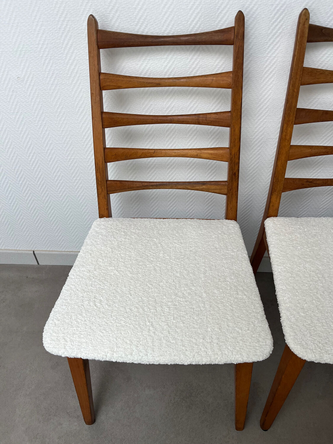 4 Scandinavian chairs, teak with boucle seats.