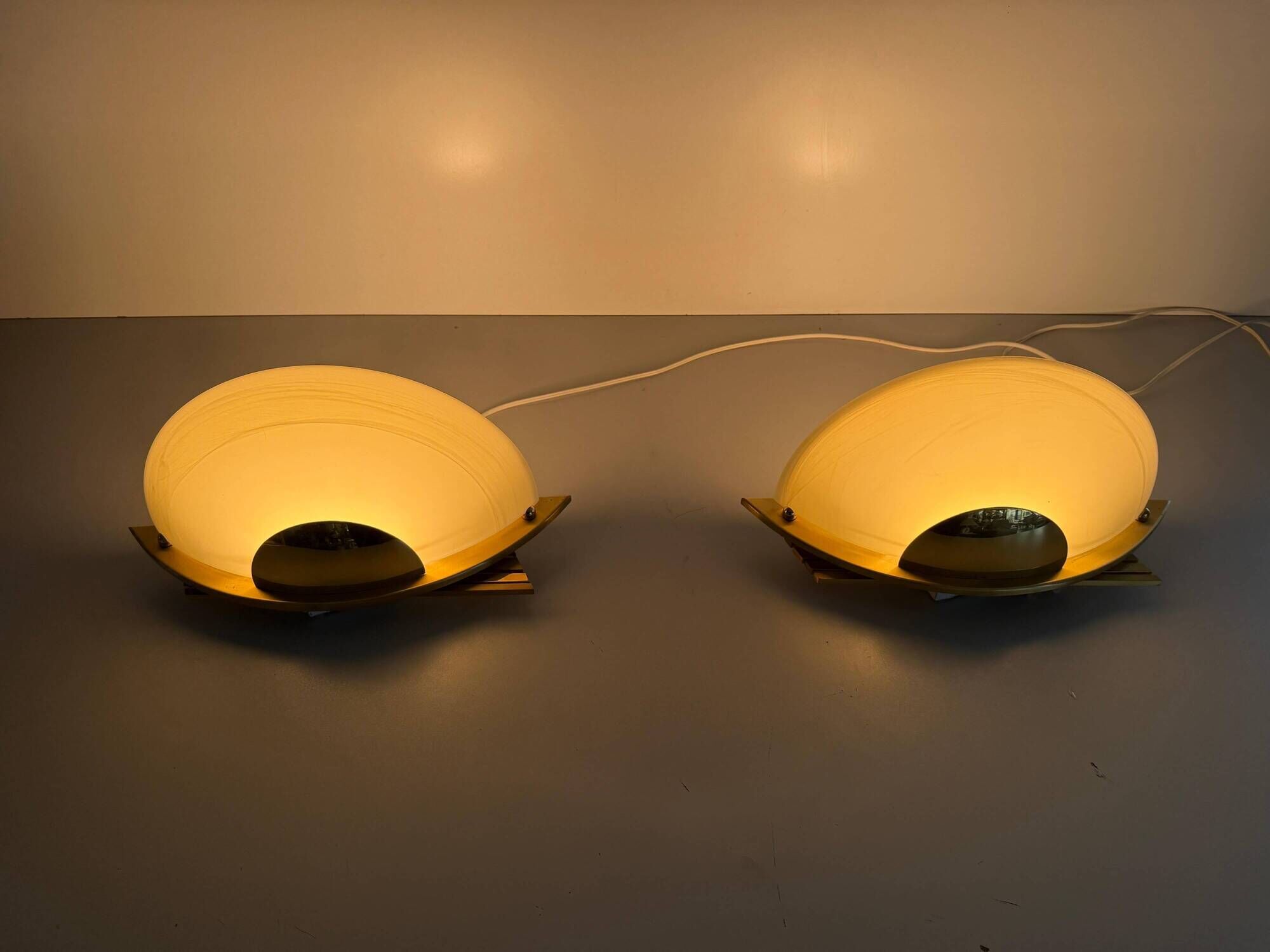Pair of brass and glass wall lights from the Spage era, 1980, Germany.