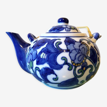 Hand-painted blue floral pattern teapot