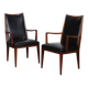 Pair of vintage wooden and leather armchairs from the 1950s.