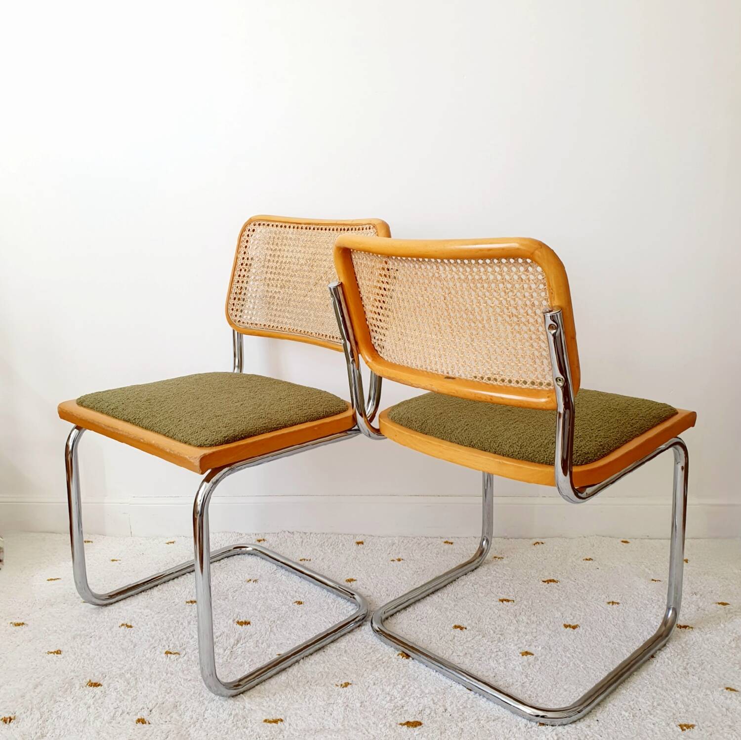 Pair of Marcel Breuer cane and fabric chairs