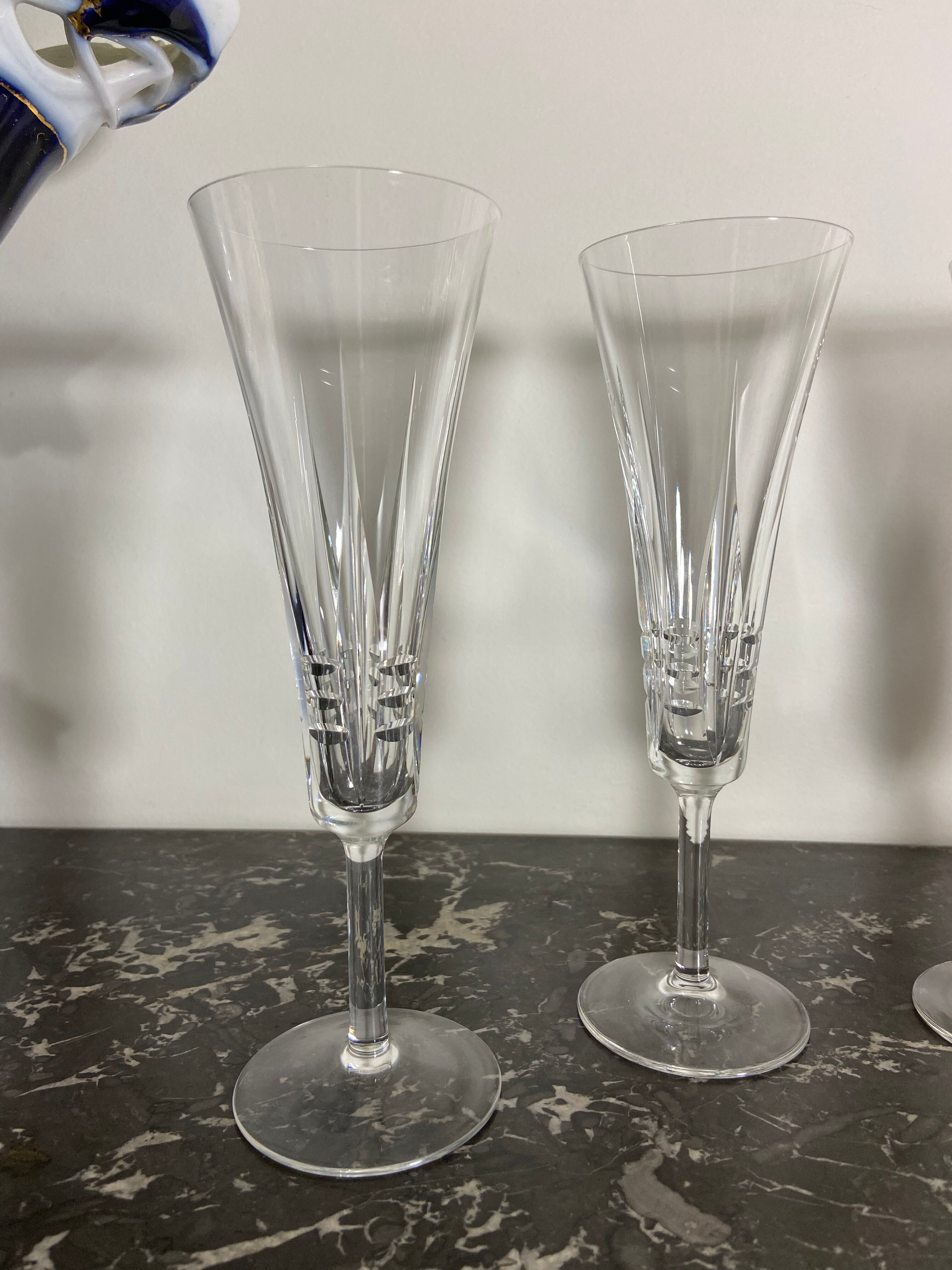 Series of 4 vintage crystal champagne flutes