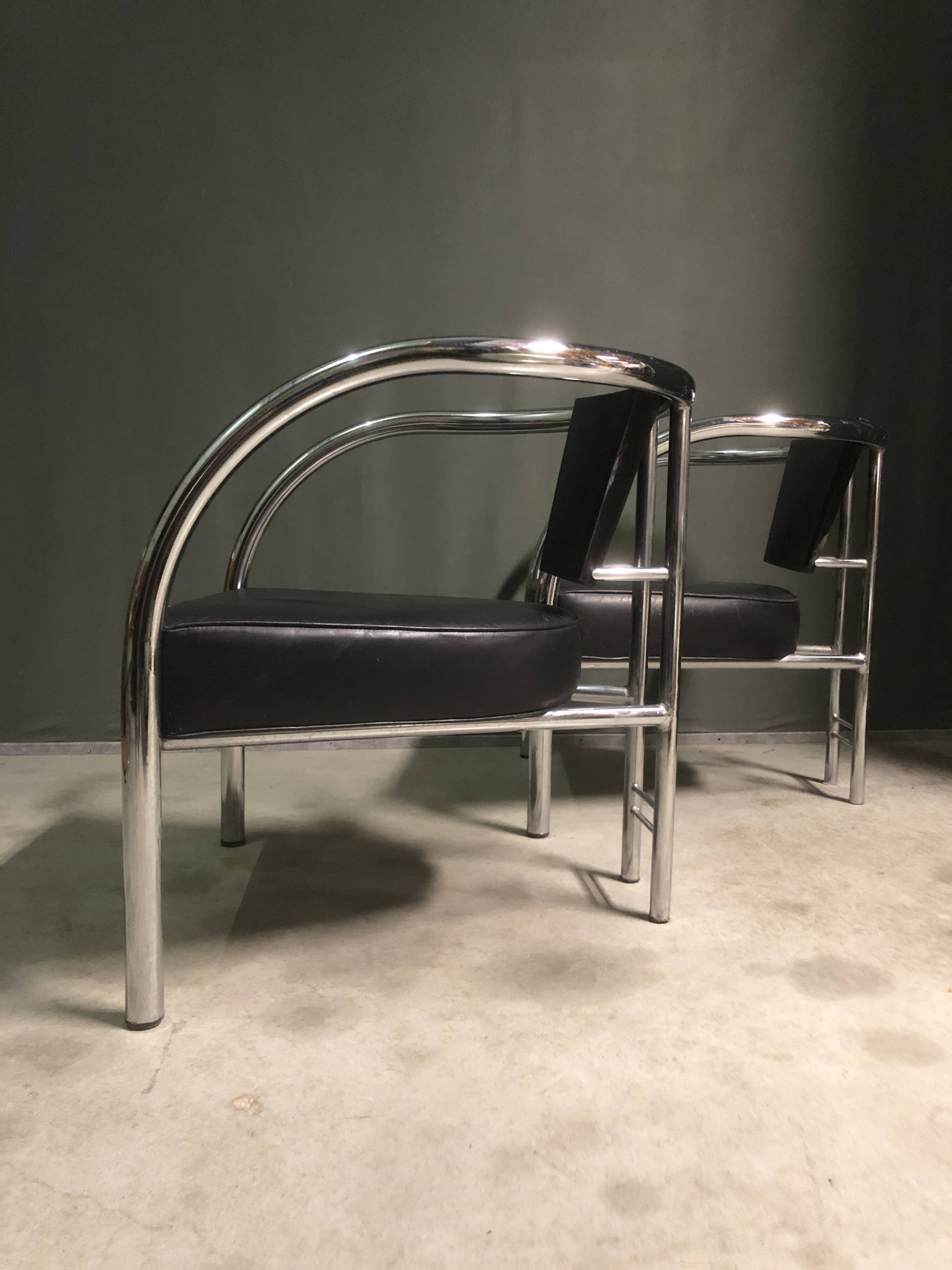 A pair of petite low armchairs by ronald cecil sportes for lumen center, 1987