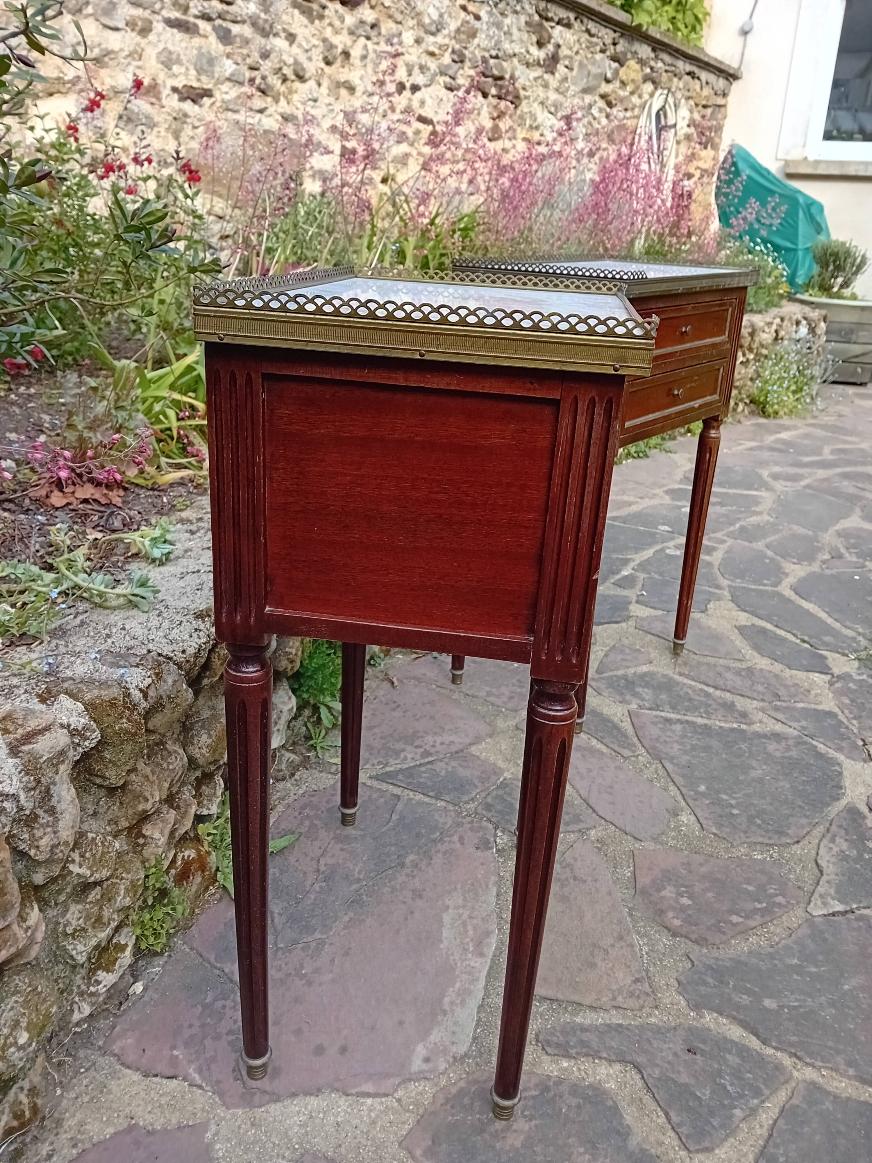 Pair of Louis XVI bedside tables.