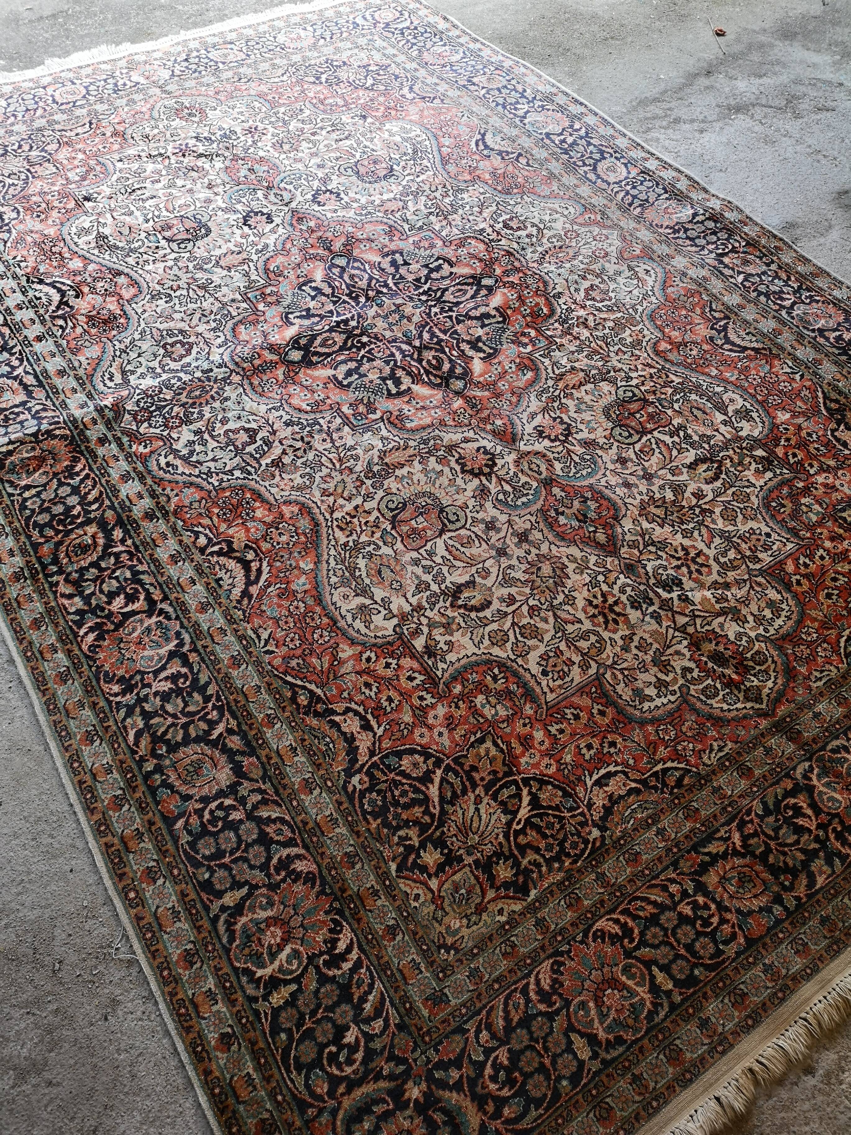 Ancient Indian silk carpet and wool