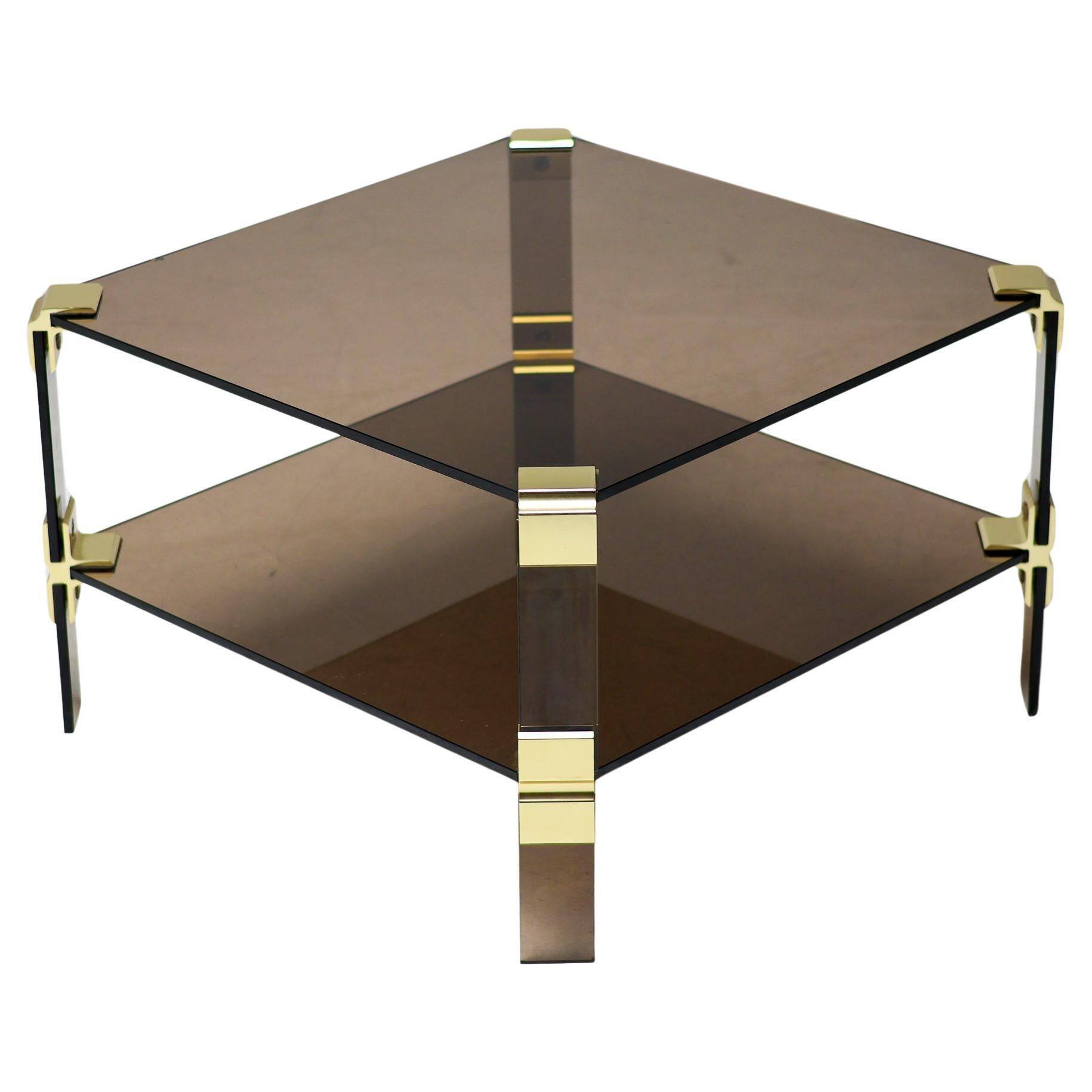 Hollywood Regency coffee table in brass and smoked glass, chic two-tier coffee table.