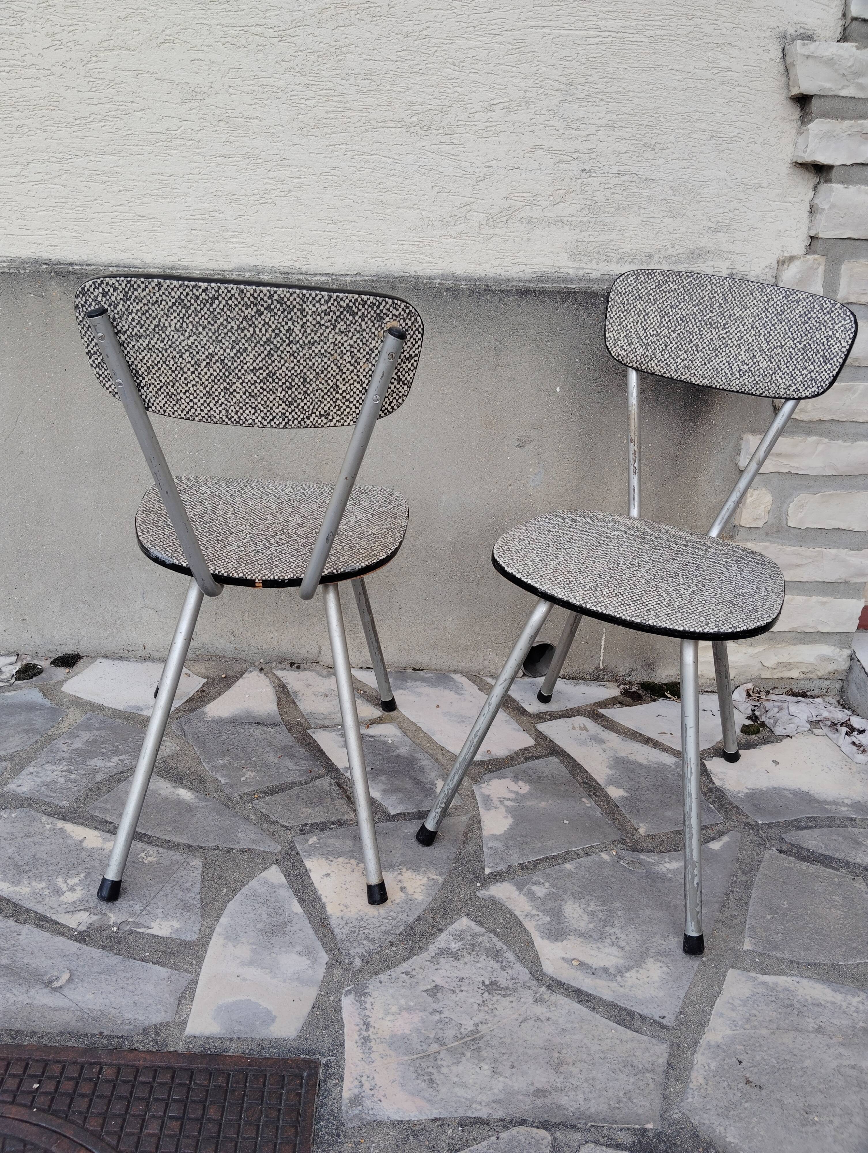 Pair of faux leather and metal chairs, 1950s-60s