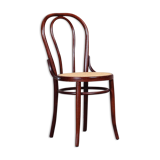 Curved wooden chair and tuna-