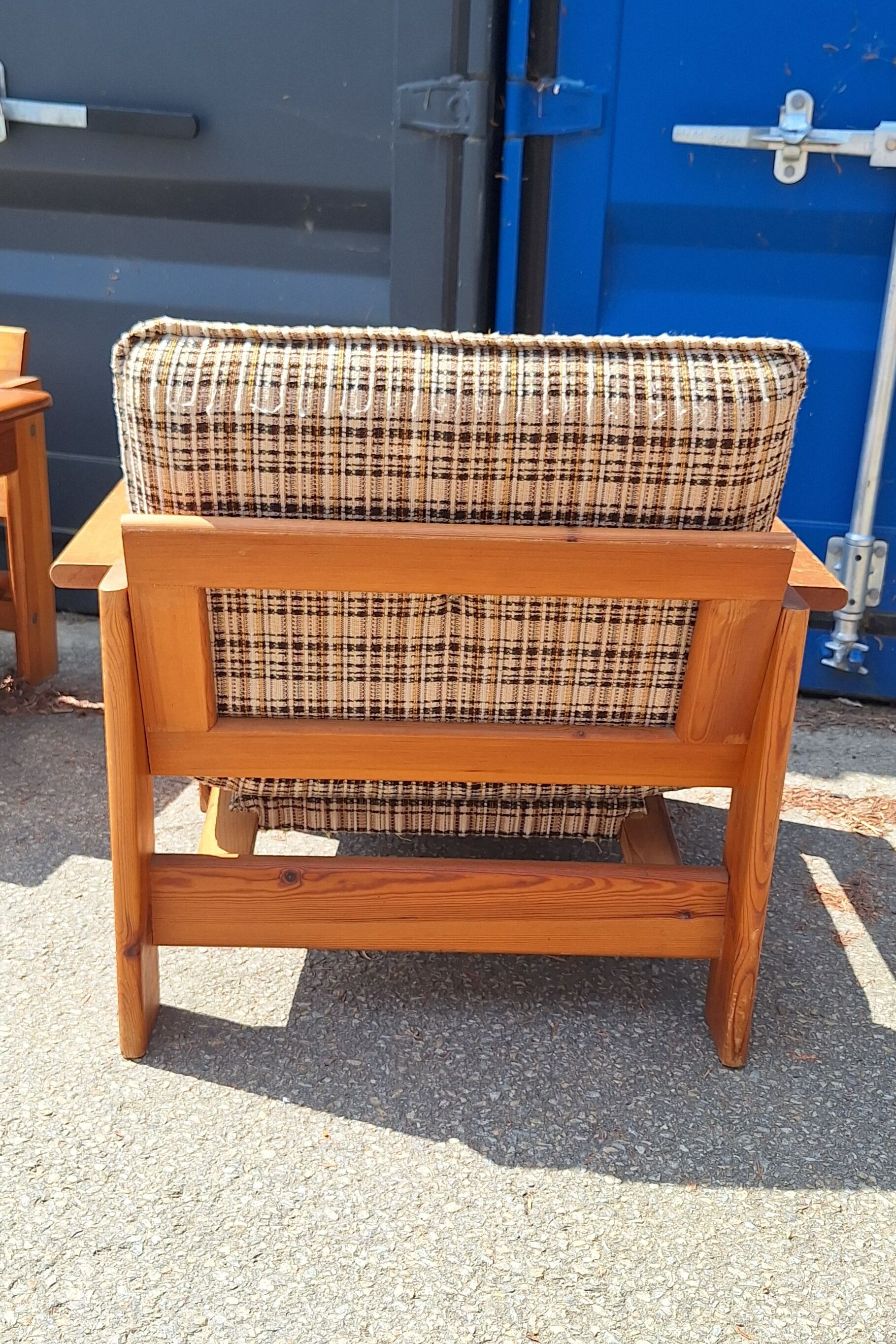 Brutalist-style bench and armchairs in 1970s pine.
