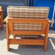 Brutalist-style bench and armchairs in 1970s pine.