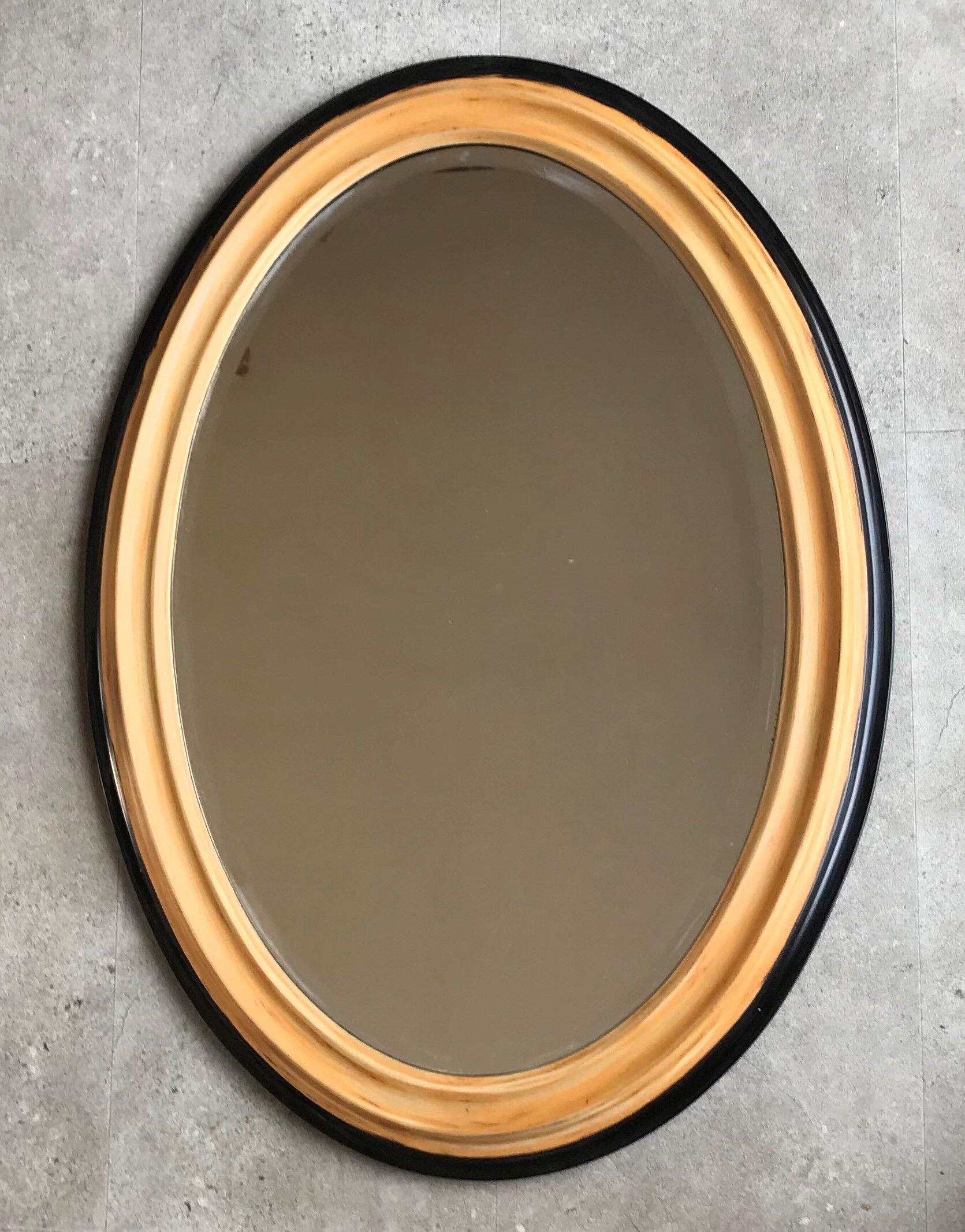 Oval mirror in wood and beveled ice - 88 cm by 63 cm