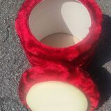 Red furry chairs and pouffe