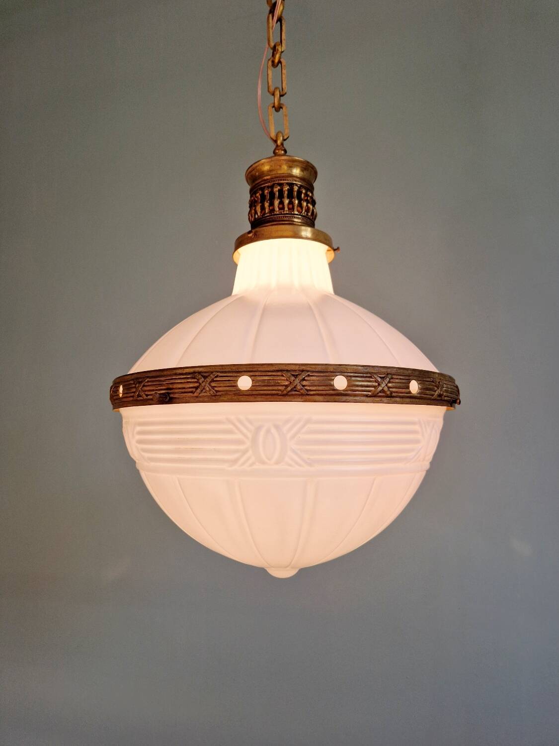 Large Art Deco pendant light in milk glass and brass, 1920s