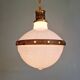 Large Art Deco pendant light in milk glass and brass, 1920s