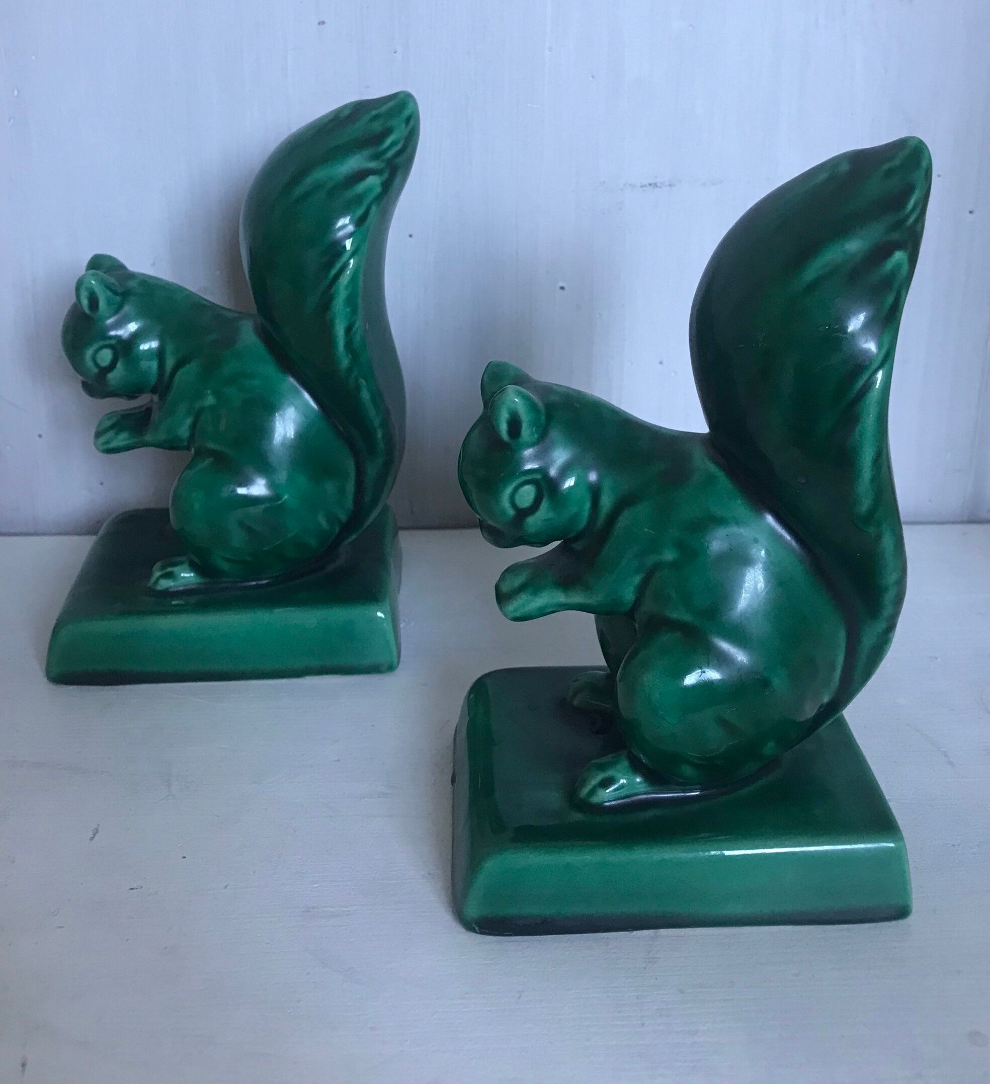 Pair of Art Deco ceramic book clamts