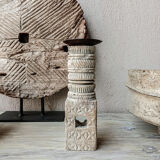 Candle holder in light carved wood