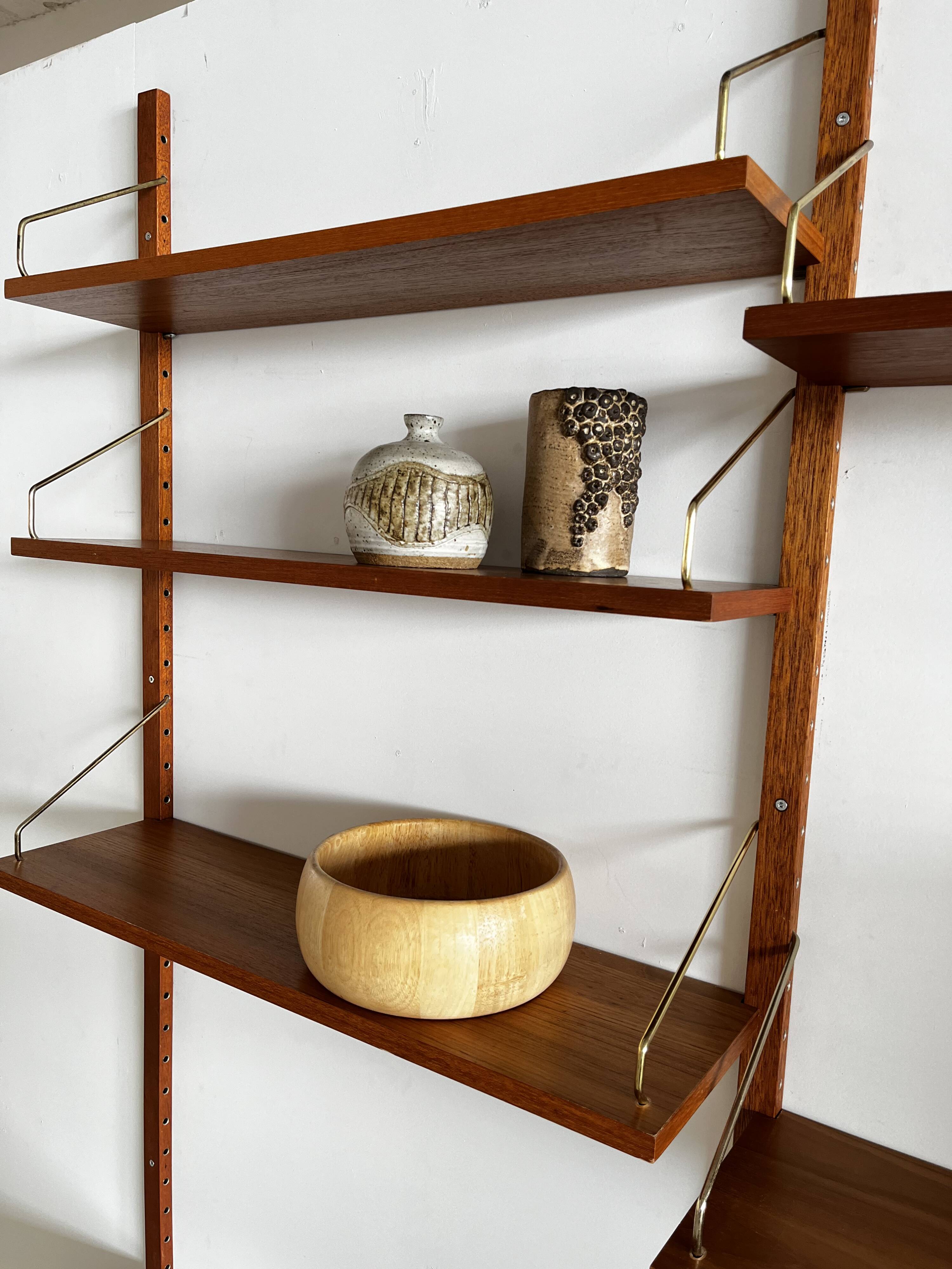 A wall unit with 4 compartments by Poul Cadovius, Denmark, 1960s.