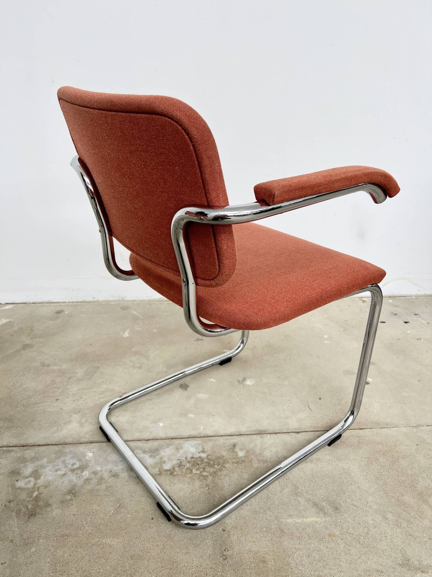 Pair of Marcel Breuer B64 Knoll armchairs in coral fabric